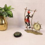 Iron-Painted-Adivasi-With-Clock2.jpg